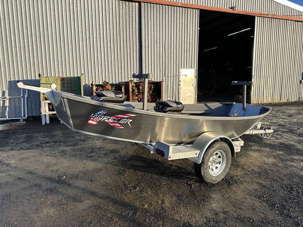 Koffler accessible drift boat on a trailer. This boat allows accessibility by mobility-challenged persons.